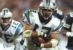 Photo of football player Sam Mills in action on the field